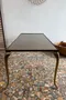 Table basse en laiton et miroir fumé années 70