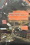 Panneau avec vue aérienne d’une usine année 60