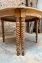 Table ronde transformable en paire de consoles