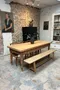 Ancienne table à rallonges en merisier – dite “table à l’italienne”
