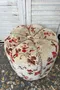 Ancien pouf fleuri 