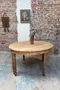Table ronde transformable en paire de consoles