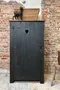 Armoire art populaire peinte en noir