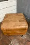 Pouf en cuir vintage 1980